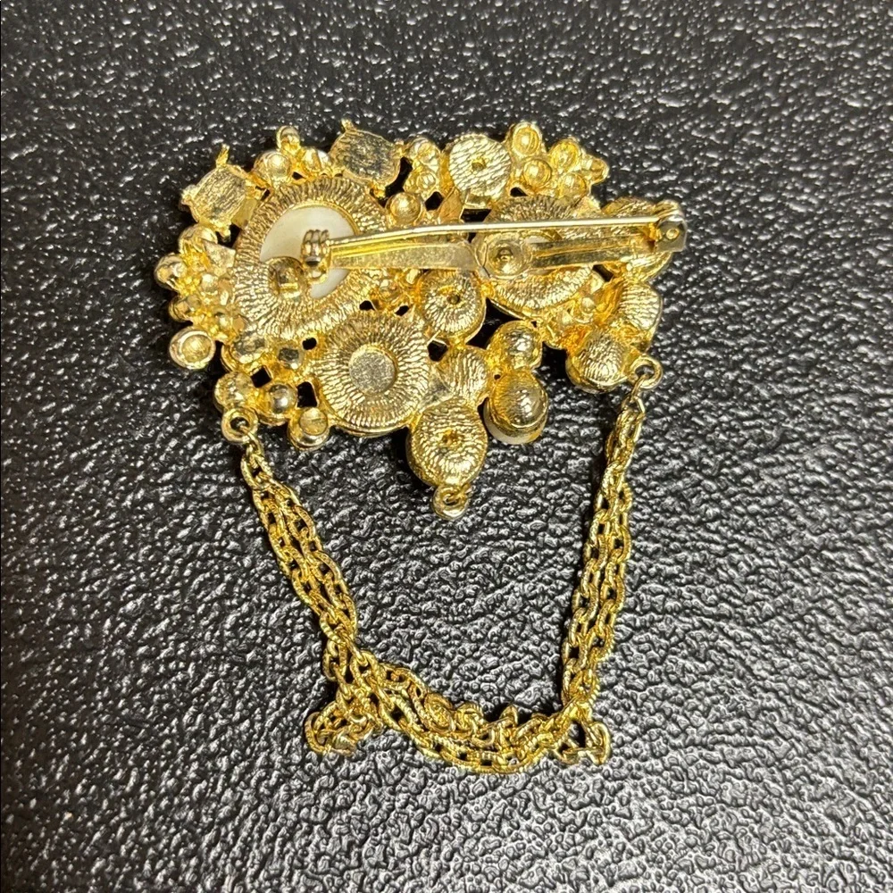 Elegant Gold and Multicolor Gemstone Brooch